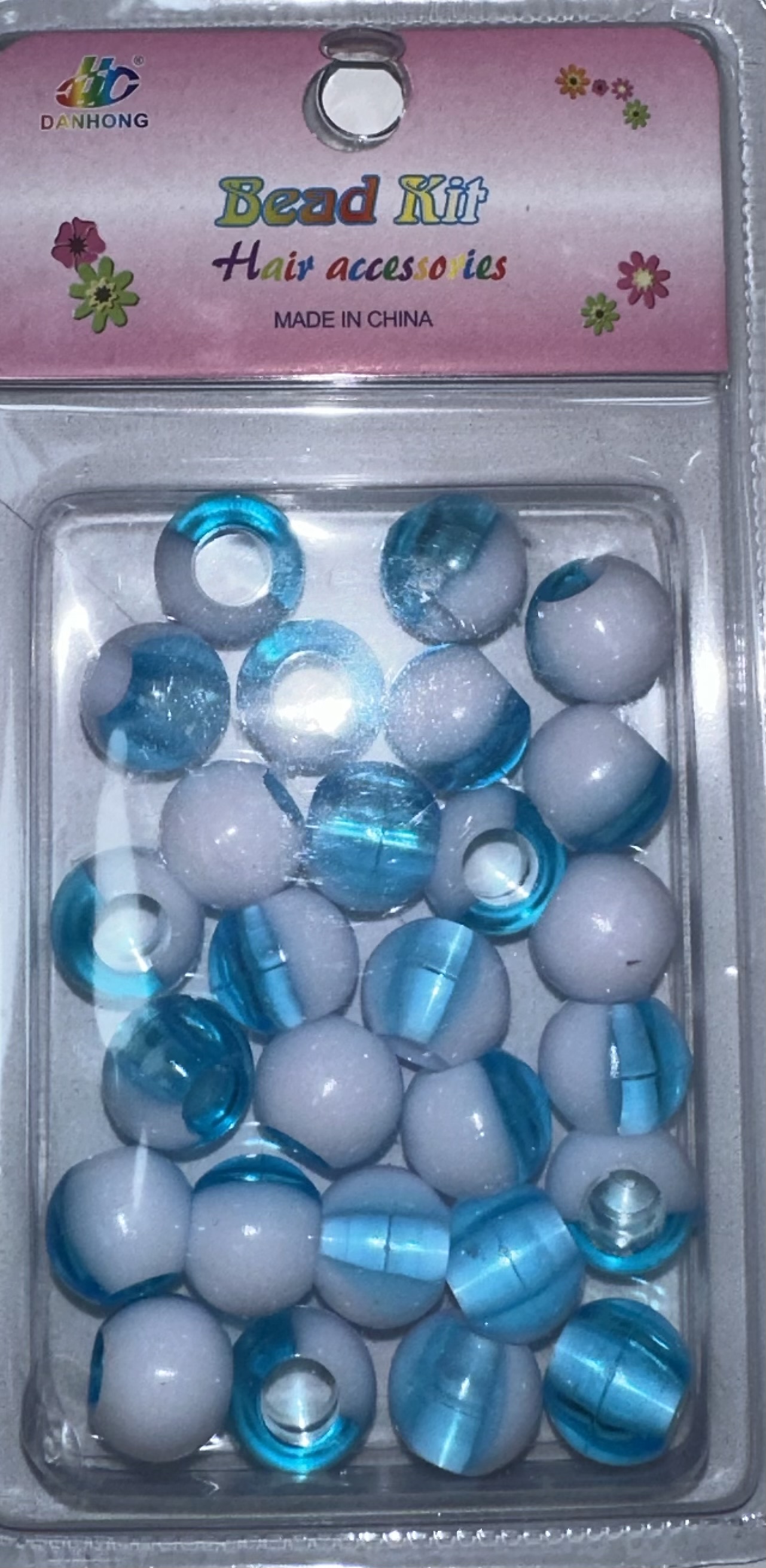 Perles rondes bicolore blanc et bleu